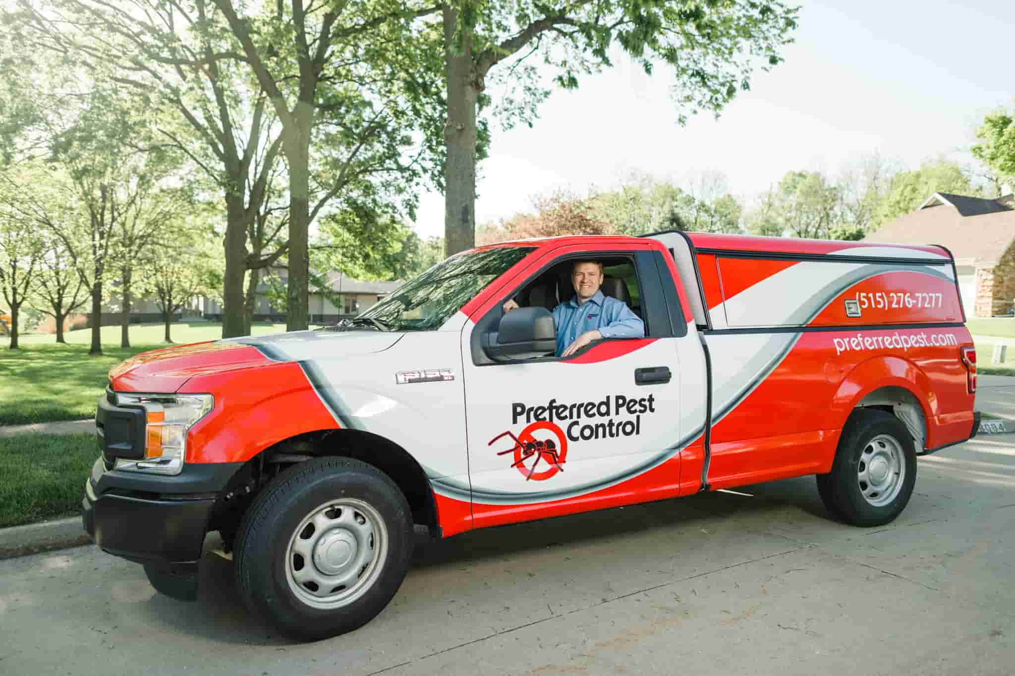 Residential Services Preferred Pest Truck With Technician In Driver Side Window Preferred Pest Truck With Technician